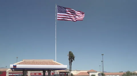 4K: Giant 60' * 40' US Flag Waves in a Stong Wind - Daytime Stock Footage 63087858