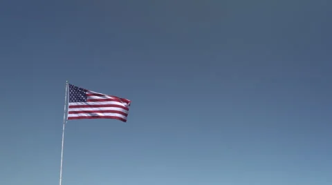 4K: Giant 60' * 40' US Flag Waves in a Stong Wind - Daytime Stock Footage 63088013