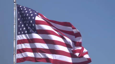4K: Giant 60' * 40' US Flag Waves in a Stong Wind - Daytime Video stock 63088060