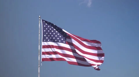 4K: Giant 60' * 40' US Flag Waves in a Stong Wind - Daytime Stock-Footage 63088247