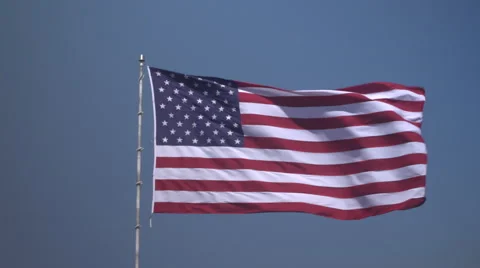 4K: Giant 60' * 40' US Flag Waves in a Stong Wind - Daytime Stock-Footage 63088359