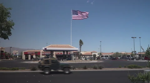 4K: Giant 60' * 40' US Flag Waves in a Stong Wind - Daytime Stock Footage 63088523
