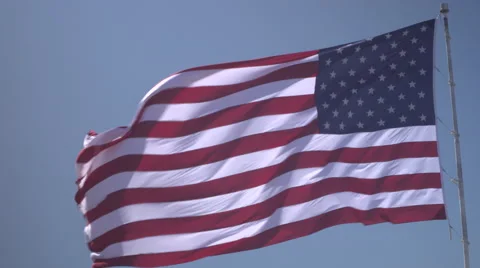 4K: Giant 60' * 40' US Flag Waves in a Stong Wind - Daytime Stock-Footage 63088952
