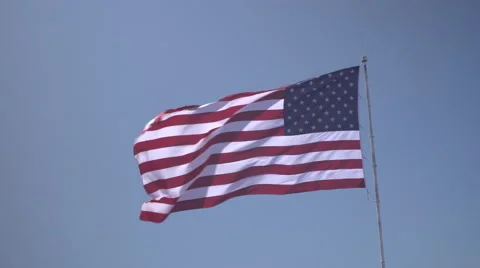 4K: Giant 60' * 40' US Flag Waves in a Stong Wind - Daytime Stock Footage 63089578