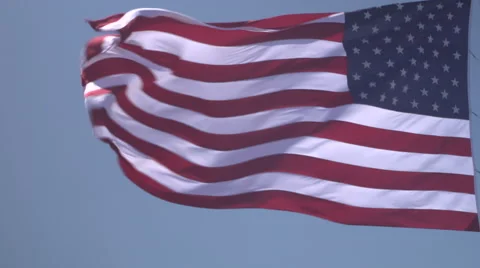 4K: Giant 60' * 40' US Flag Waves in a Stong Wind - Daytime Stock-Footage 63089692