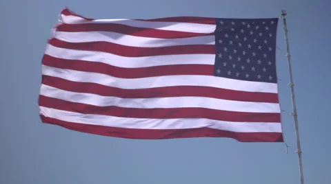 4K: Giant 60' * 40' US Flag Waves in a Stong Wind - Daytime Stock Footage 63089799