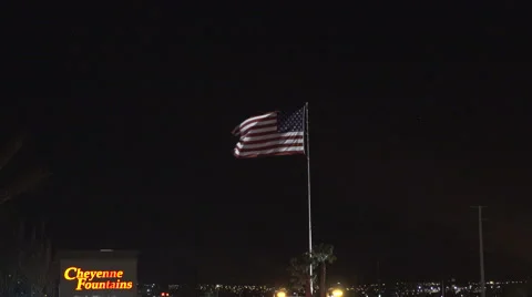 4K: Giant US Flag Waves at Night Against a Black Sky Stock Footage 63085548