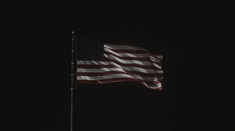 4K: Giant US Flag Waves at Night Against a Black Sky Stock-Footage 63086318