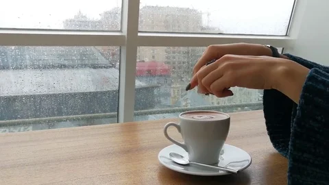 4K Girl In Cafe, Adding Sugar Into Cup Of Cofee, Mixing By Spoon &amp; Drinking Stock Footage 82948259