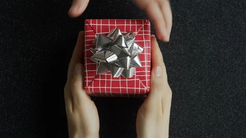 4K Giving red gift box on black background. Christmas, Valentines day, Birthday. 스톡 동영상 121303613