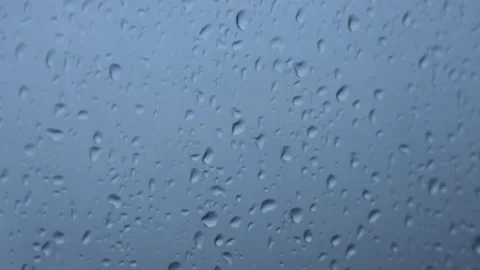 4K glass window raining raindrops artistic conception empty mirror real shot Stock Footage 333684960