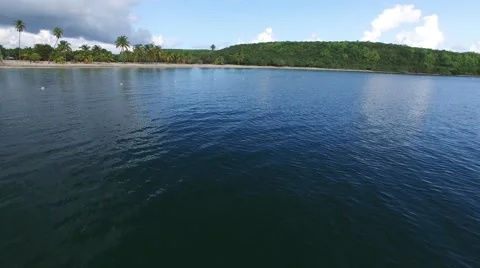 4K Gliding over Water Back to Shore Stock Footage 63473032
