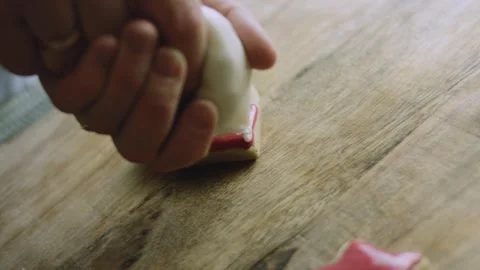 4K Gloved Hand Working Closely over a Holiday Cookie Stock Footage 342113610
