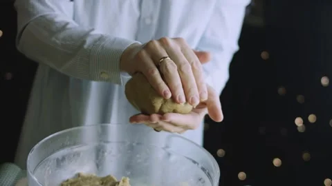 4K Gloved Hands Shaping a Finished Ball of Gingerbread Dough Stock Footage 342113370