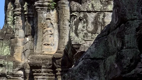 4K God statue at Ta Prohm temple. Figure of one deities in Hinduism Cambodia-Dan Stock Footage 119060136