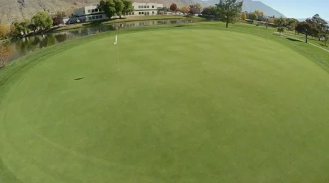 4K Golf Course Aerial Fly towards pin Stock Footage 42945831