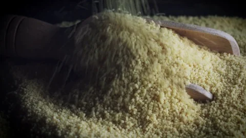 4k Grains Background, Couscous Falling on Scoop Video stock 77641617