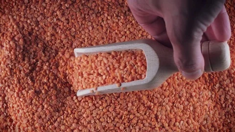 4K Grains Background, Red Lentils Pouring from Scoop Stock Footage