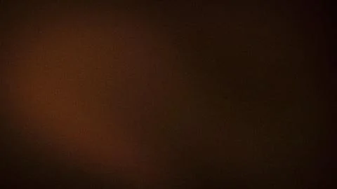 This 4K grainy abstract background features a dark brown color palette with s Stock Photos