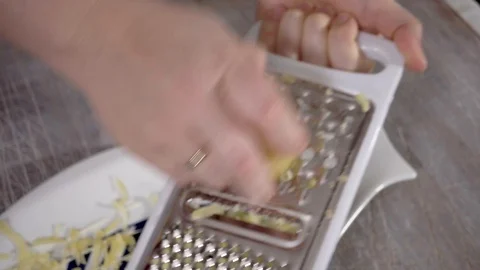 4k, grate potatoes, close-up, Potato. Preparation of a dish herring under a fur  Stock Footage 101222956