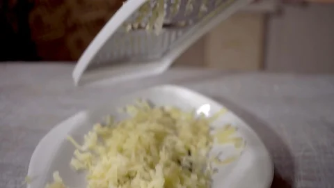 4k, grate potatoes, close-up, Potato. Preparation of a dish herring under a fur  Stock Footage 101223342