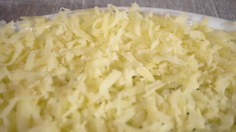 4k, grate potatoes, close-up, Potato. Preparation of a dish herring under a fur  Stock Footage 101225842