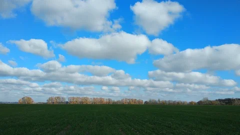 4k green field and cloudy sky. timelapse. Stock Footage 97920413