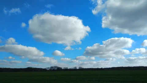 4k green field and cloudy sky. timelapse. Stock Footage 97920535