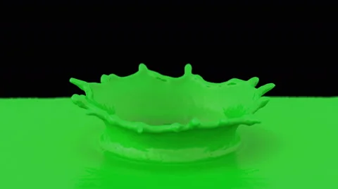 4k green paint drop falling in slow motion in green paint Stock Footage 59737666