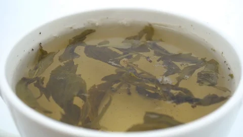 4k Green Tea In A White Cup Stock Footage 88535905