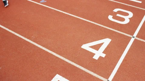 4K Group of athletes (disabled &amp; able bodied) celebrate victory on running track Stock Footage 56482214