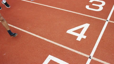 4K Group of athletes (disabled &amp; able bodied) celebrate victory on running track Stock Footage 56482778