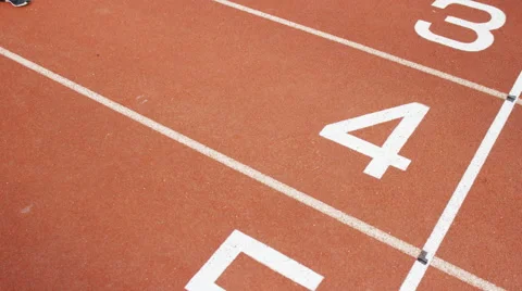 4K Group of athletes (disabled &amp; able bodied) celebrate victory on running track Stock Footage 56483151