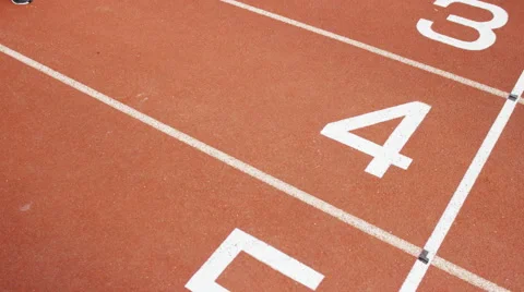 4K Group of athletes (disabled &amp; able bodied) celebrate victory on running track Stock Footage 56483215
