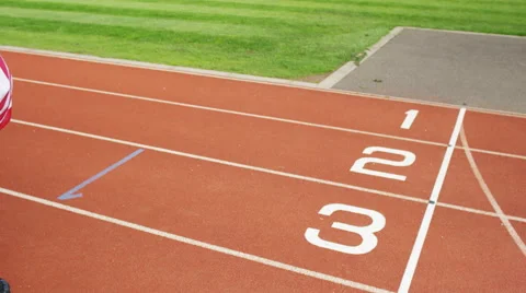 4K Group of athletes (disabled &amp; able bodied) celebrate victory on running track Stock Footage 56484058