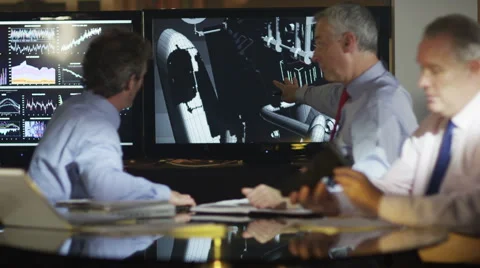 4K Group of engineers or architects discuss a building project Stock Footage 47583692