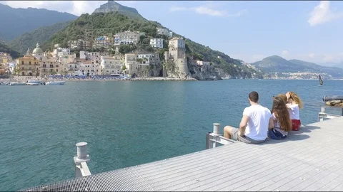4K group of friends cheering overe Amalfi coast Stock Footage 92447671