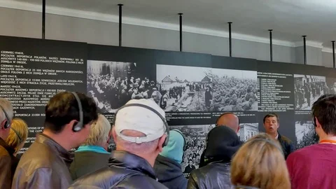 4K Group Tour of Concentration Camp, Oswiecim Poland, Auschwitz Stock Footage 71230494