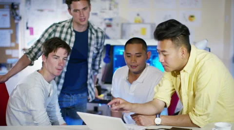 4K Group of young male computer programmers working together in small office 스톡 동영상 54482150