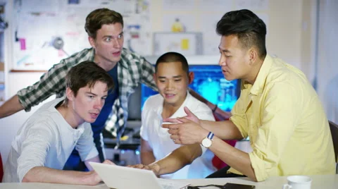 4K Group of young male computer programmers working together in small office 스톡 동영상 54483398