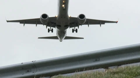 4K Guardrail with airplane passing by Stock Footage 35003660