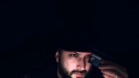 4k Hacker Man on Black Background Using Credit Card Stock Footage 86156831