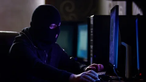 4K  Hacker with mask breaking code. Stock Footage 71932059