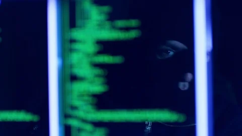 4K Hacker with mask breaking code. Stock Footage 71933301