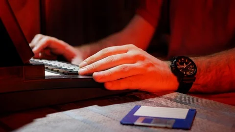 4k Hacker works at dark room spy soft developing with red background light Stock Footage 87182352