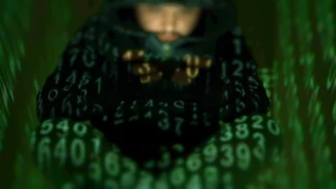 4K Hacker Writing On Phone in Flow of Numbers Code Green  Stock Footage 96288683