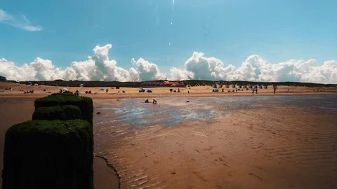 4K Half Timelapse / Half Real-Time Day at the Beach Stock Footage 111615547