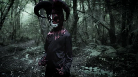 4k Halloween Shot of a Child in Joker Costume Moving Creepy Fingers Stock Footage