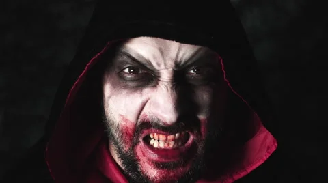4k Halloween Shot of a Creepy Man Grimacing with blood Stock Footage