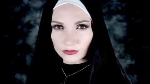 4k Halloween Shot of a Horror Nun Turning Evil Stock Footage